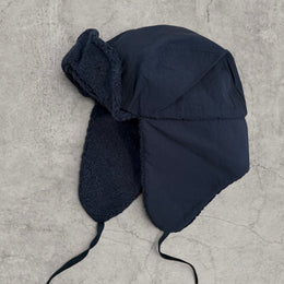 Russian trapper bonnet hat in black with black fleece.