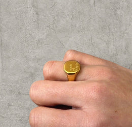 Vintage style gold colour stainless steel signet ring with made of magic engraving