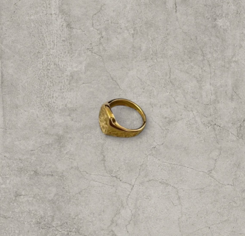 Vintage style gold colour stainless steel signet ring with made of magic engraving