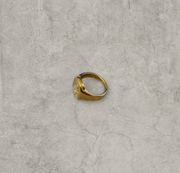 Vintage style gold colour stainless steel signet ring with made of magic engraving