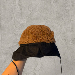 Trapper Russian cap brown/beige fleece and grey ear flaps.
