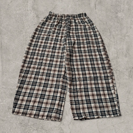 Wide leg checkered plaid trousers with elasticated waist in brown.