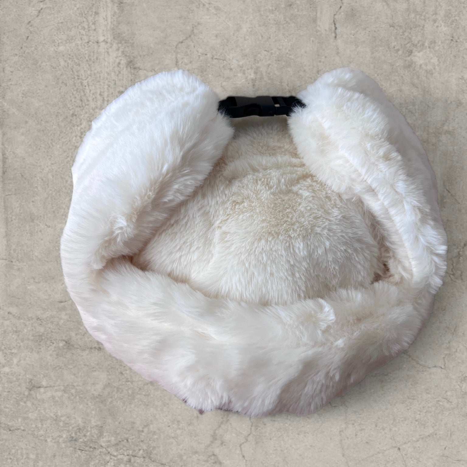Russian ushanka hat in white/cream faux fur.