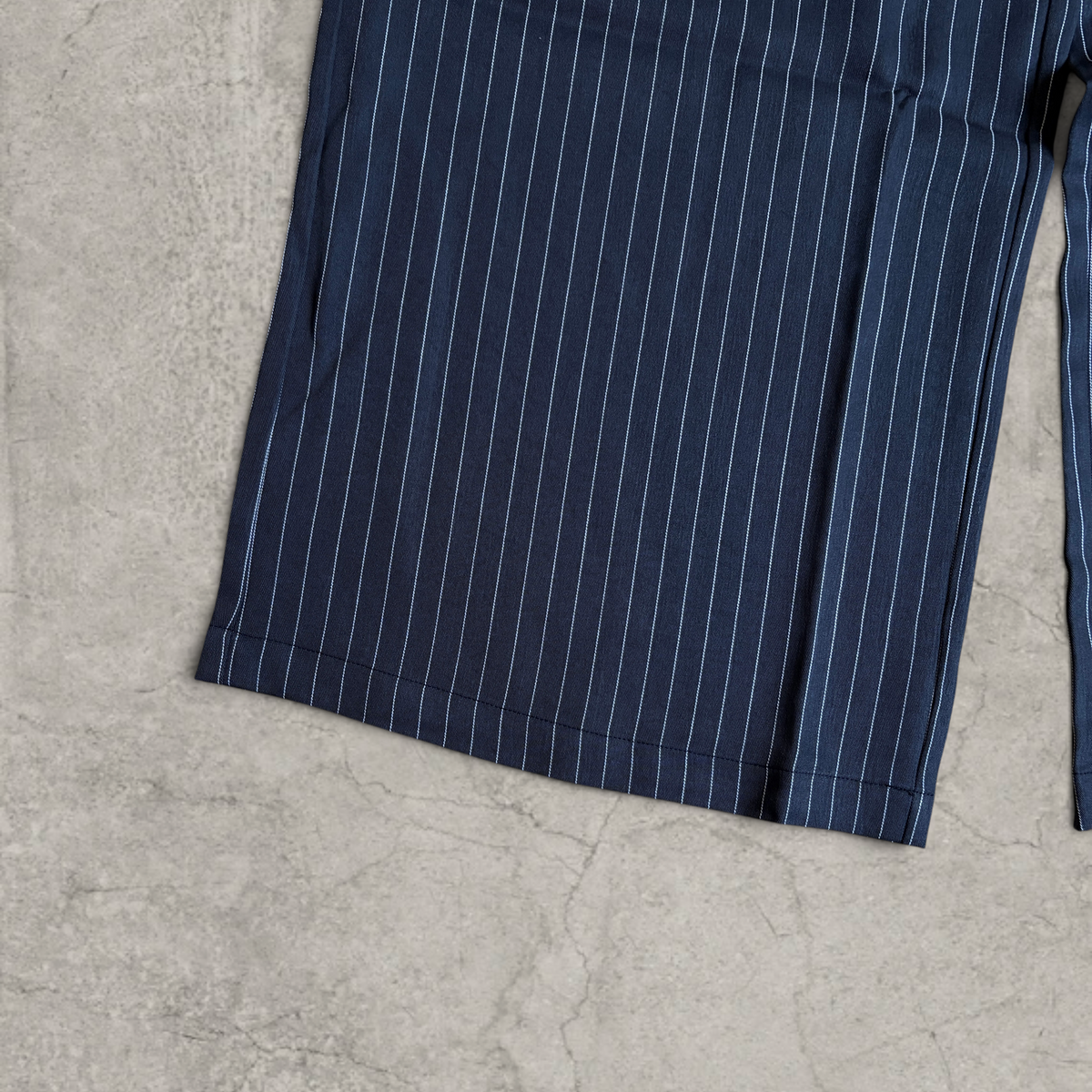 Wide-leg pinstriped tailored trousers in grey with white pinstripe
