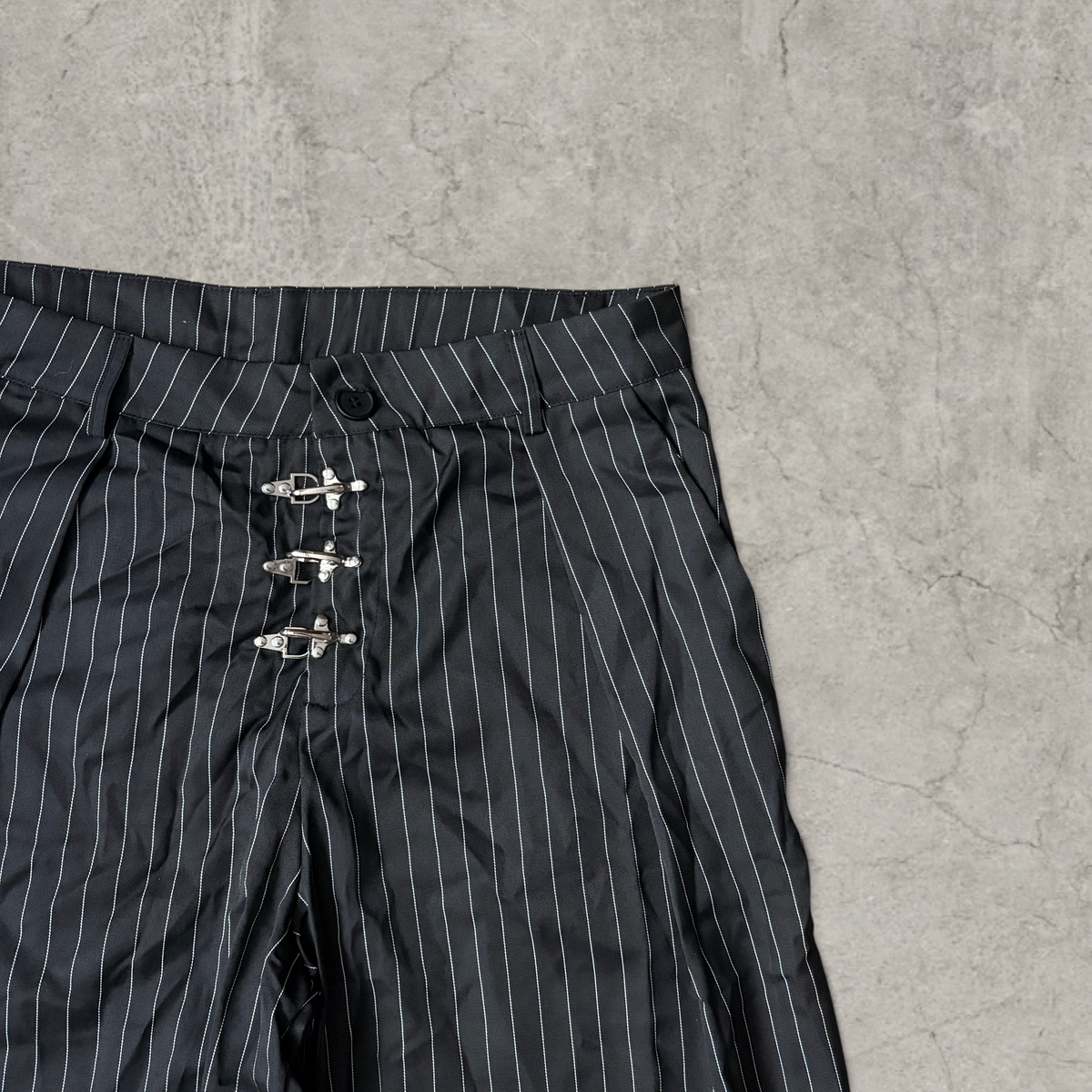 Wide-leg pinstriped tailored trousers in black with white pinstripe
