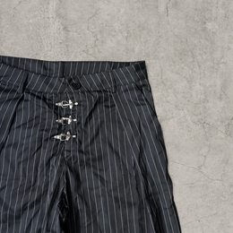 Wide-leg pinstriped tailored trousers in black with white pinstripe