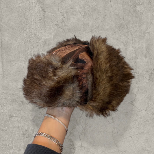 Russian ushanka hat in brown camo tree print with faux fur.