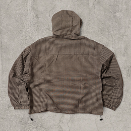 Black and brown checkered gorpcore jacket hood and zip.