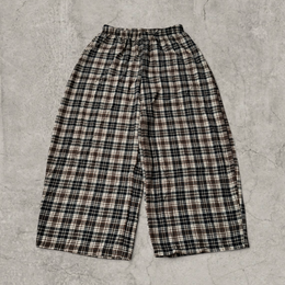 Wide leg checkered plaid trousers with elasticated waist in brown.