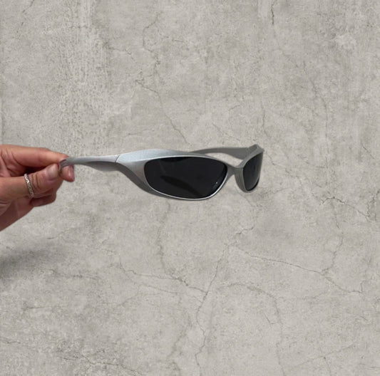 Wrap-around UV400 sunglasses in silver, black lenses one size