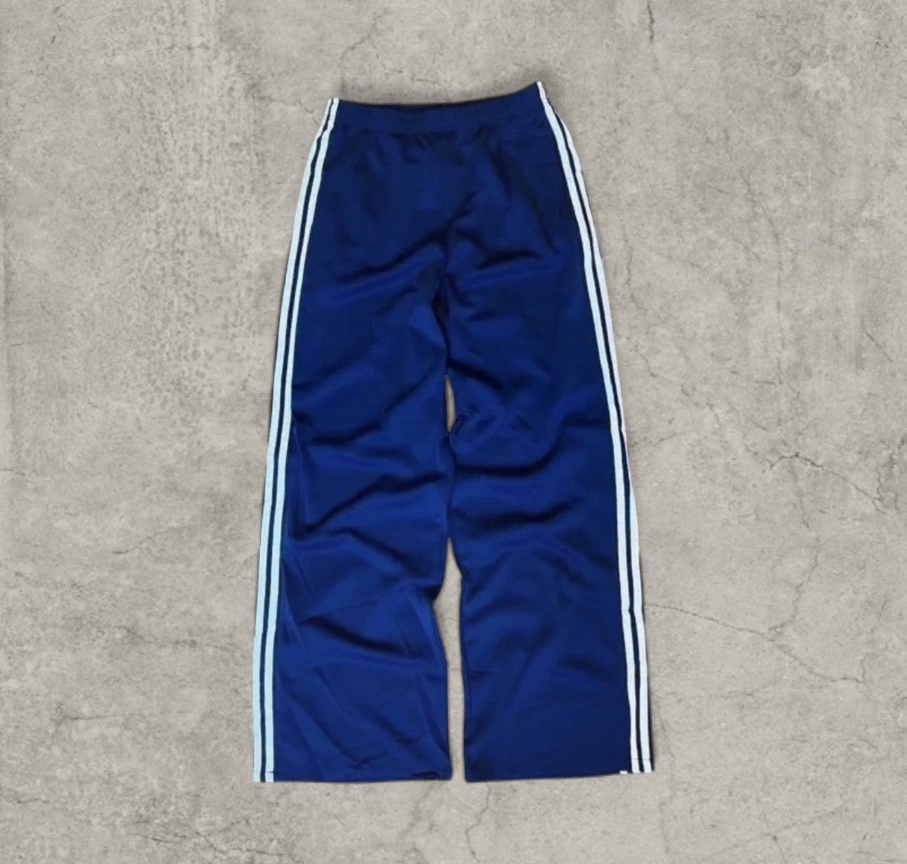Baggy relaxed fit trousers with white stripes in dark blue
