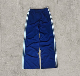 Baggy relaxed fit trousers with white stripes in dark blue
