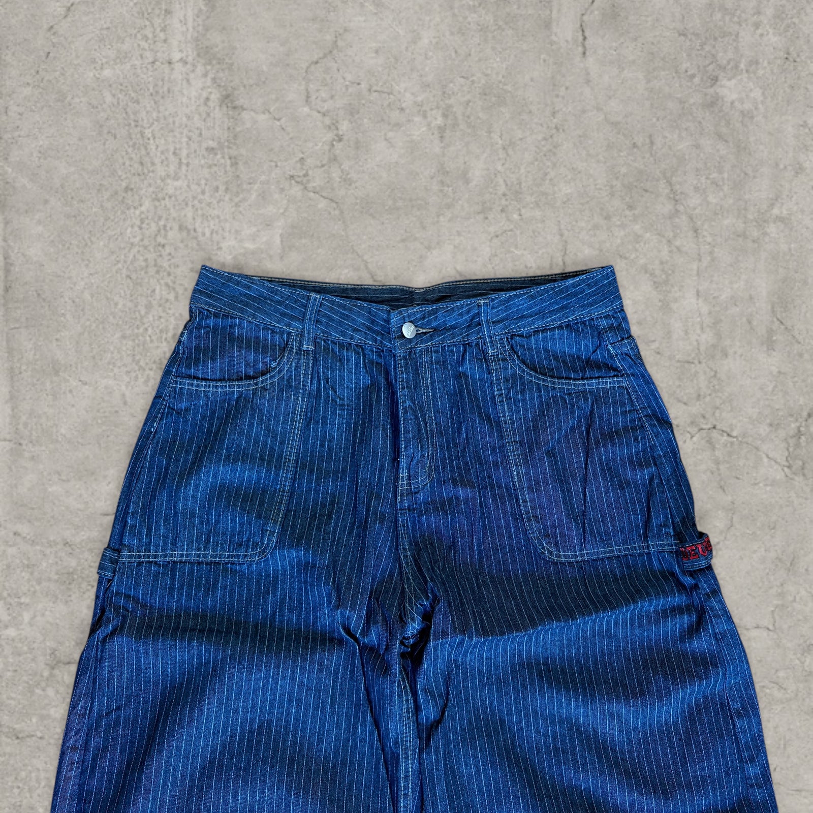 Wide leg skater jeans pinstripe detailing in washed navy blue