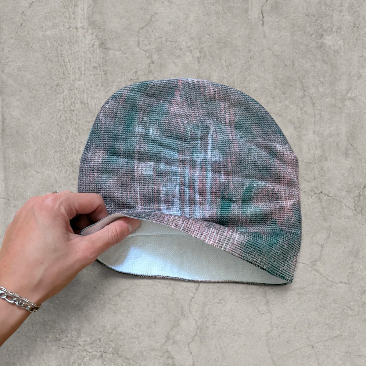 Japanese knit beanie hat in brown/purple with graffiti print.