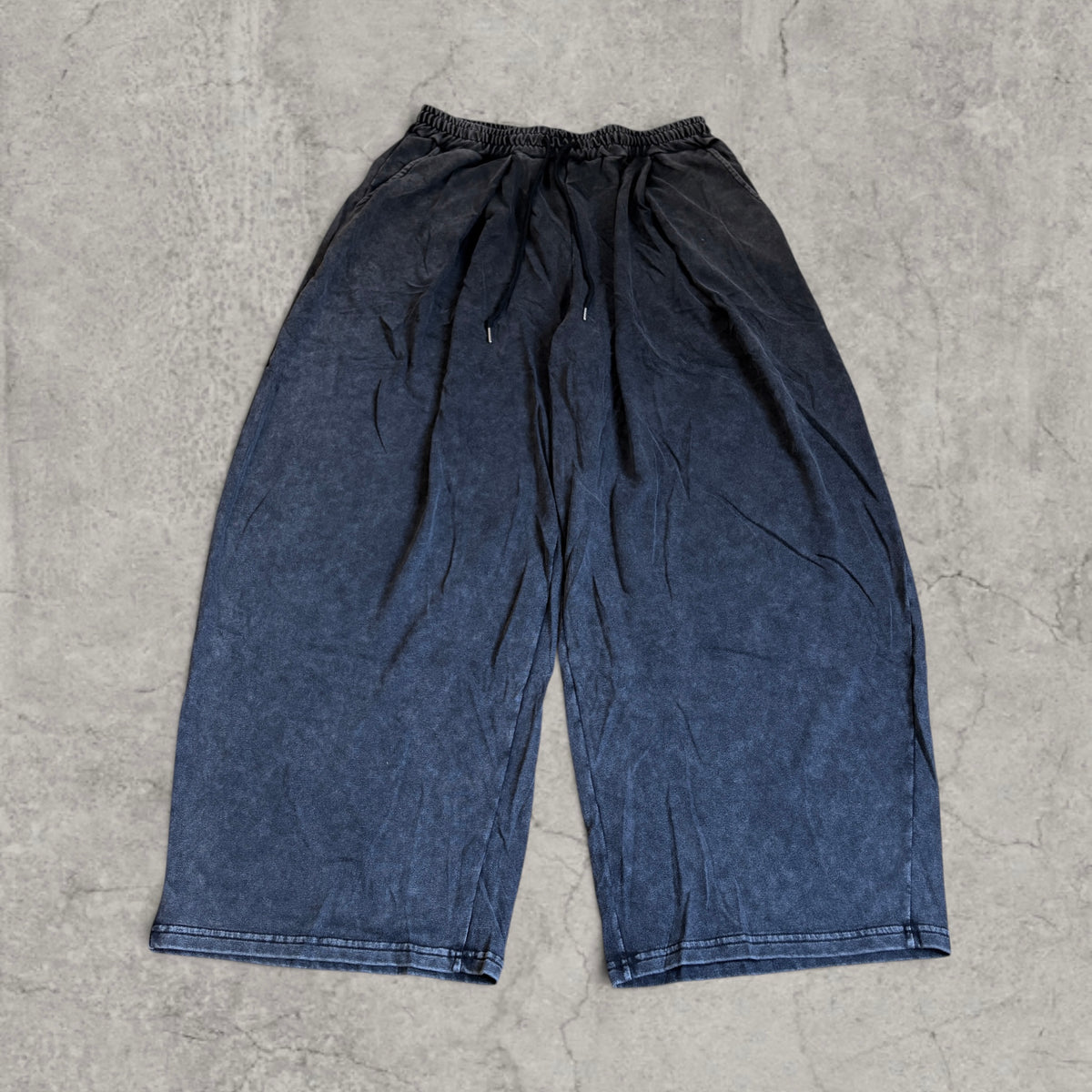 Super baggy wide leg Korean joggers in black/grey.