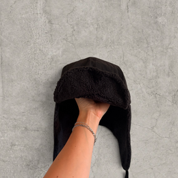 Russian trapper bonnet hat in black with black fleece.