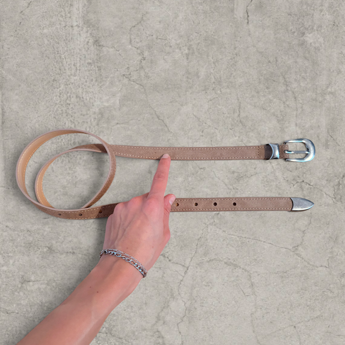 Smart tailored formal belt in beige with silver trim.