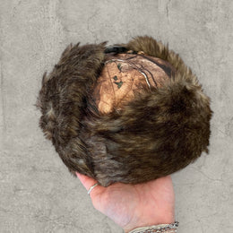 Russian ushanka hat in brown camo tree print with faux fur.