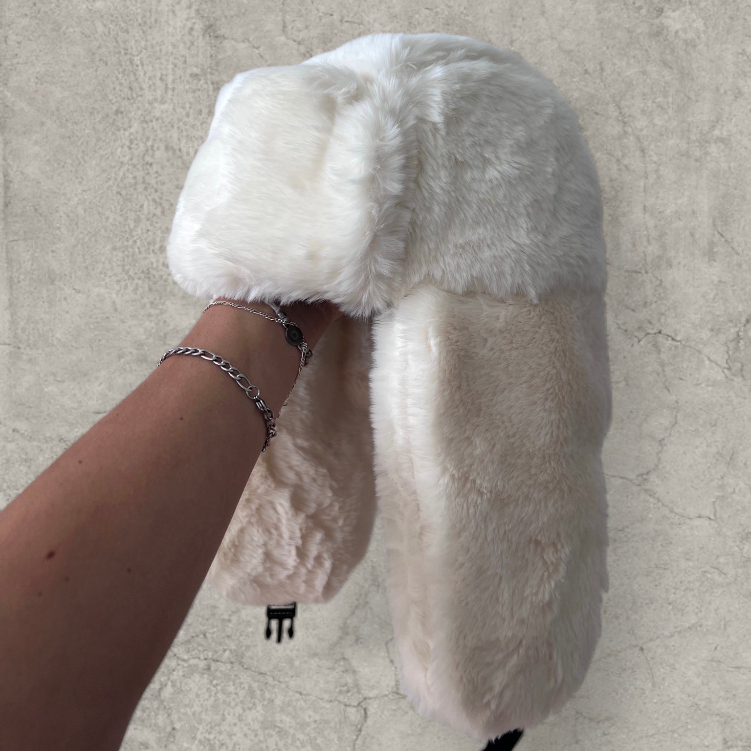 Russian ushanka hat in white/cream faux fur.
