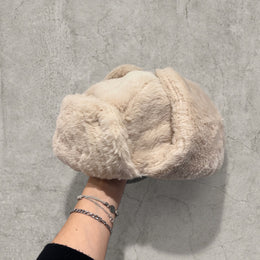 Russian ushanka hat in cream/apricot faux fur.