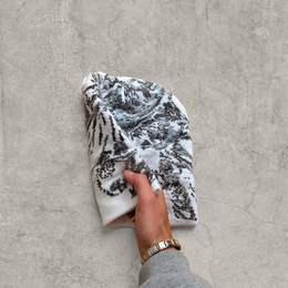 Japanese knit beanie hat in white/grey with swirl print