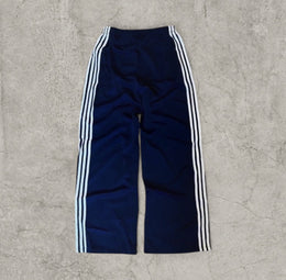 Baggy relaxed fit trousers with white stripes in dark blue