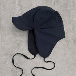 Russian trapper bonnet hat in black with black fleece.