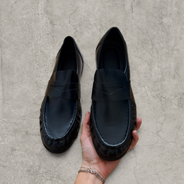 Faux leather penny dress loafers shoes in black.