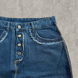 Wide-leg skater jeans in washed blue with raw hem.