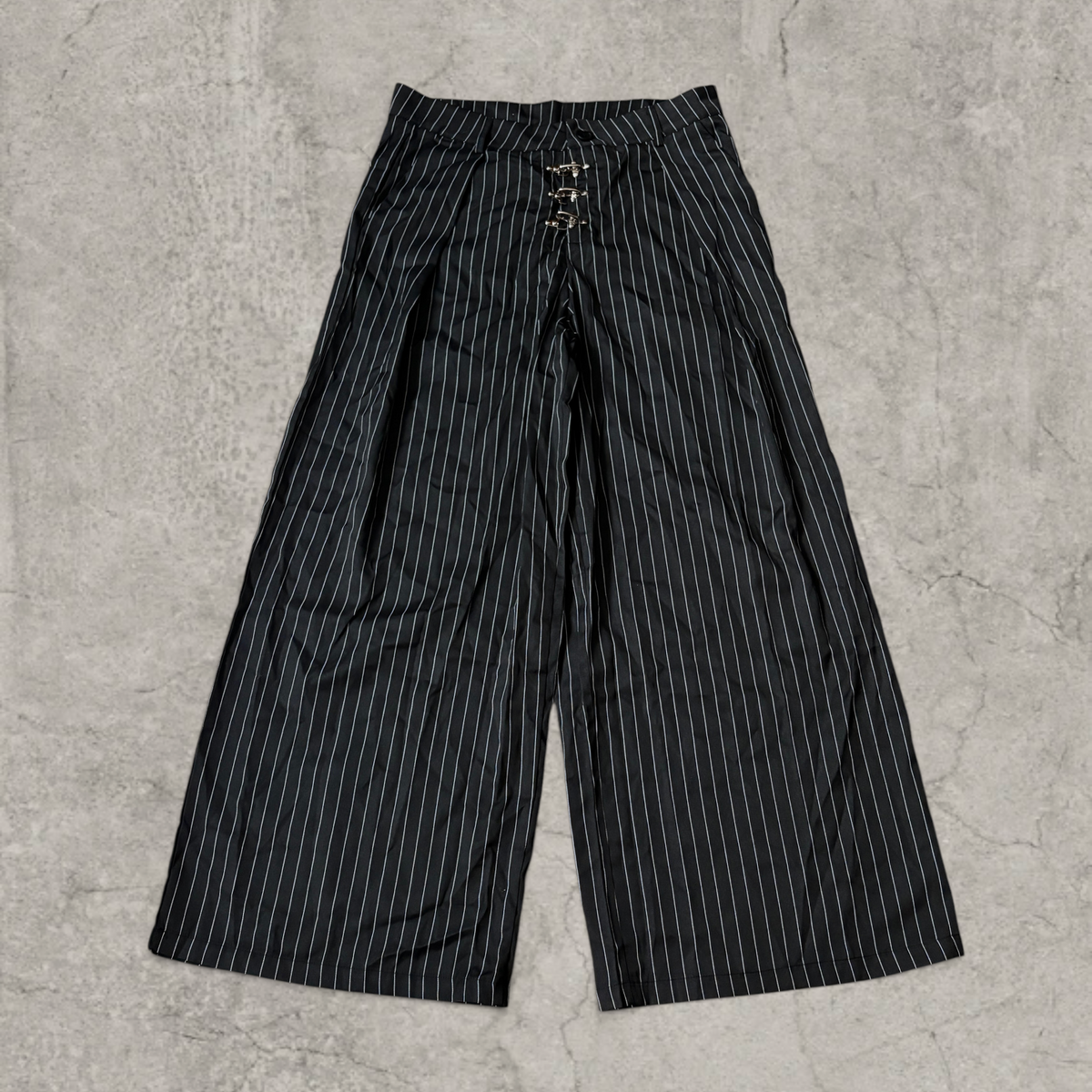 Wide-leg pinstriped tailored trousers in black with white pinstripe