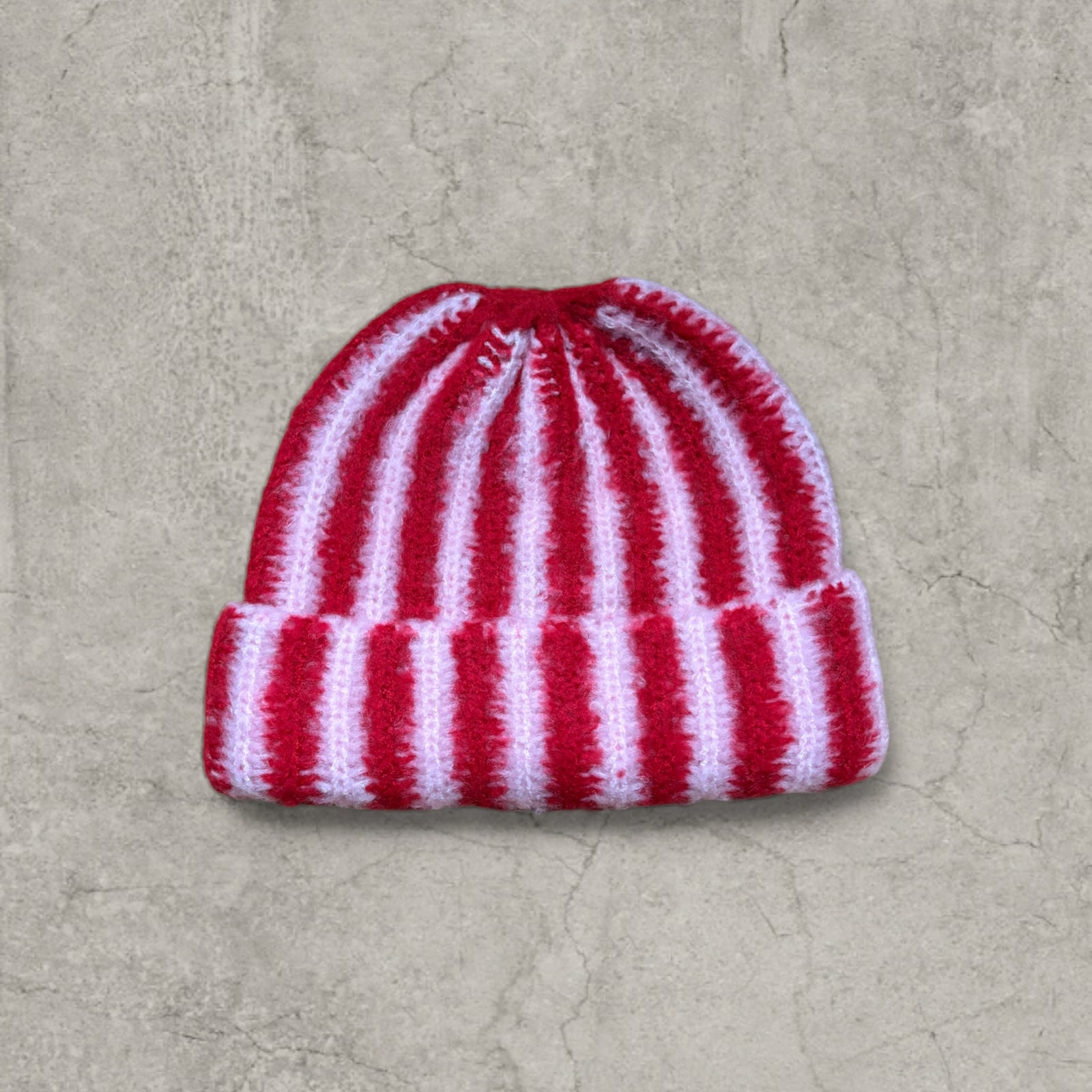 Striped knit beanie hat in red and pink