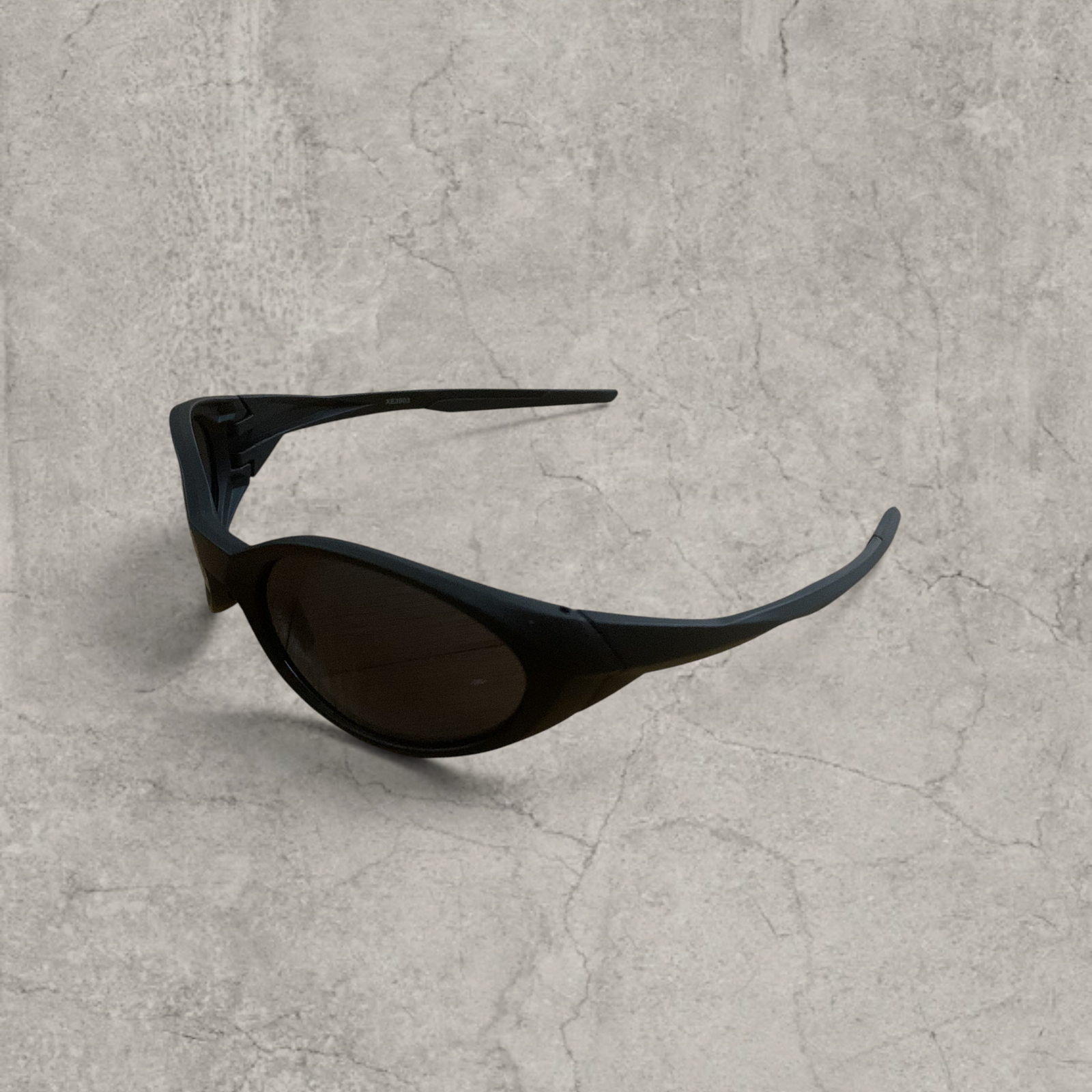 UV400 sunglasses with black lens in black frame.