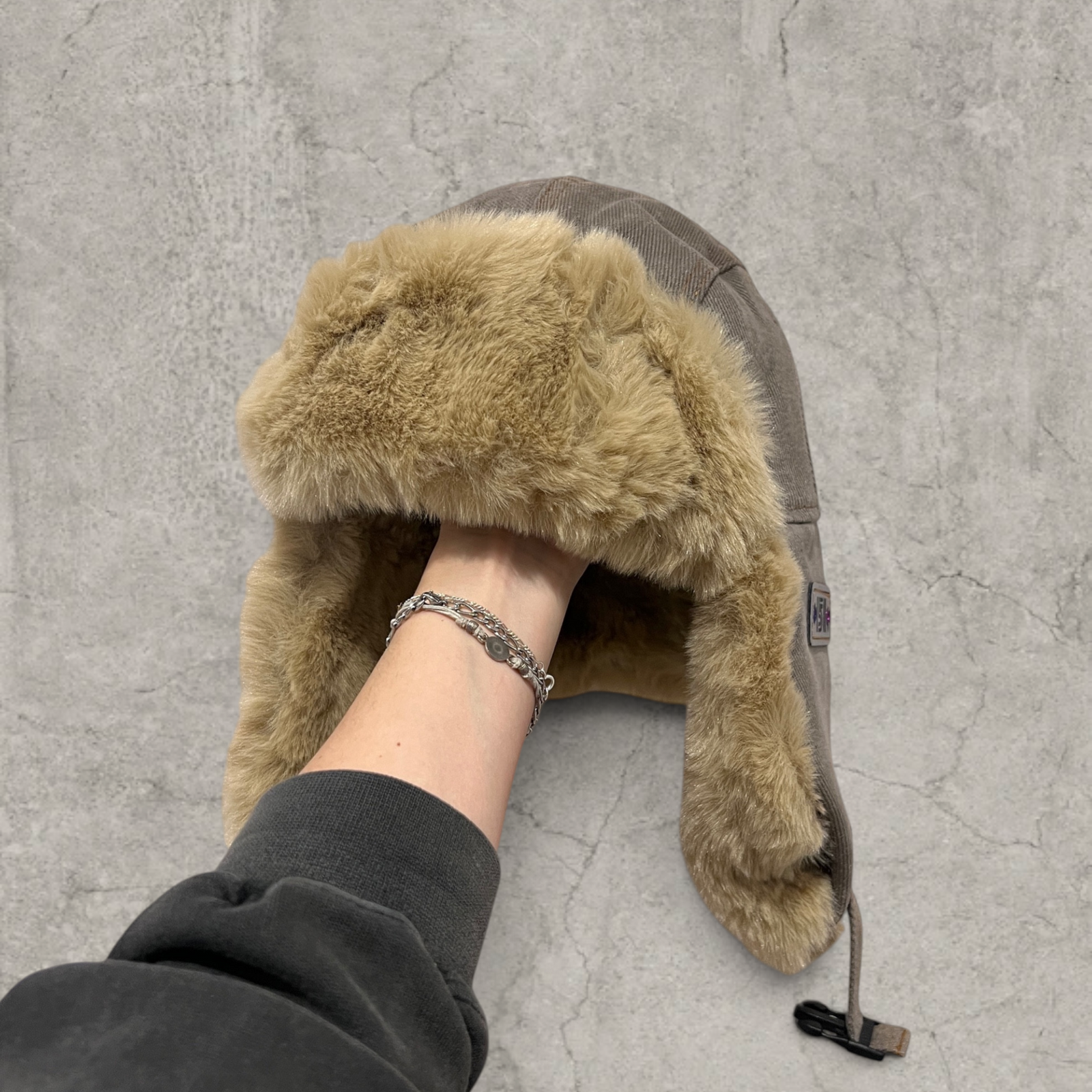 Russian ushanka hat in grey  with beige faux fur.