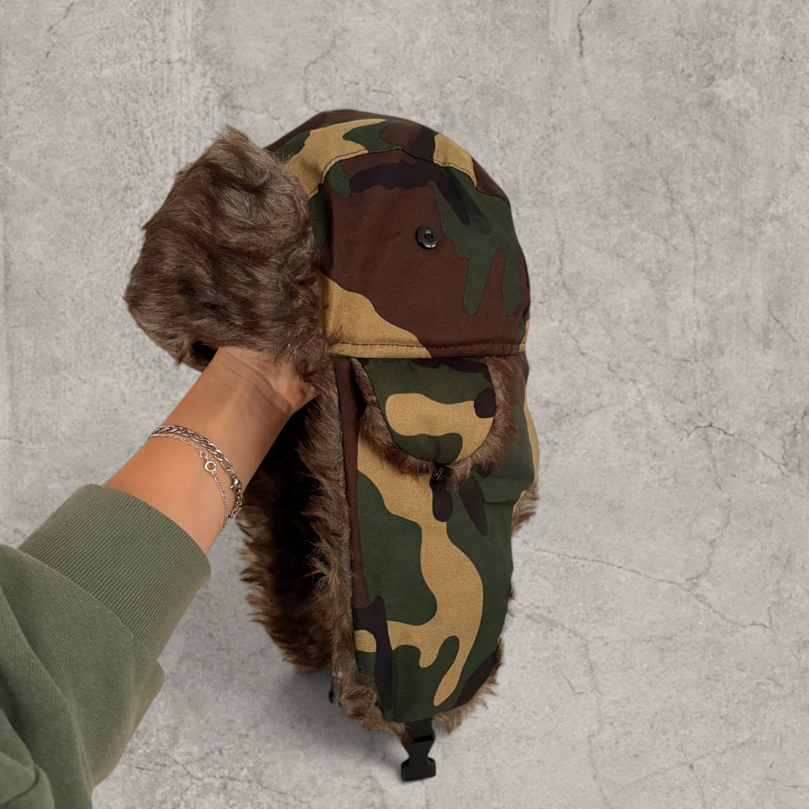 Russian ushanka hat in khaki camo print with faux fur.