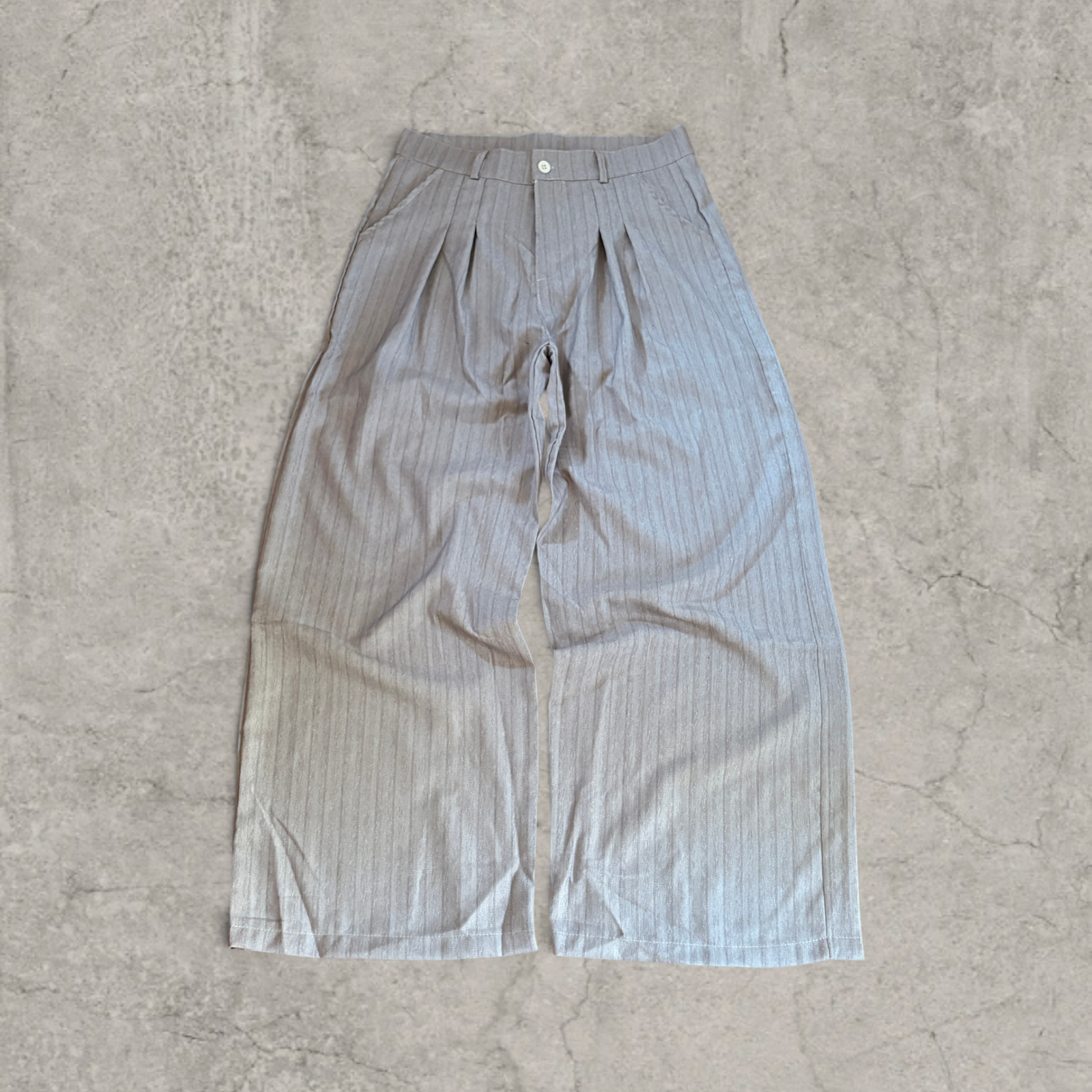 Wide-leg pinstriped trousers in beige cream