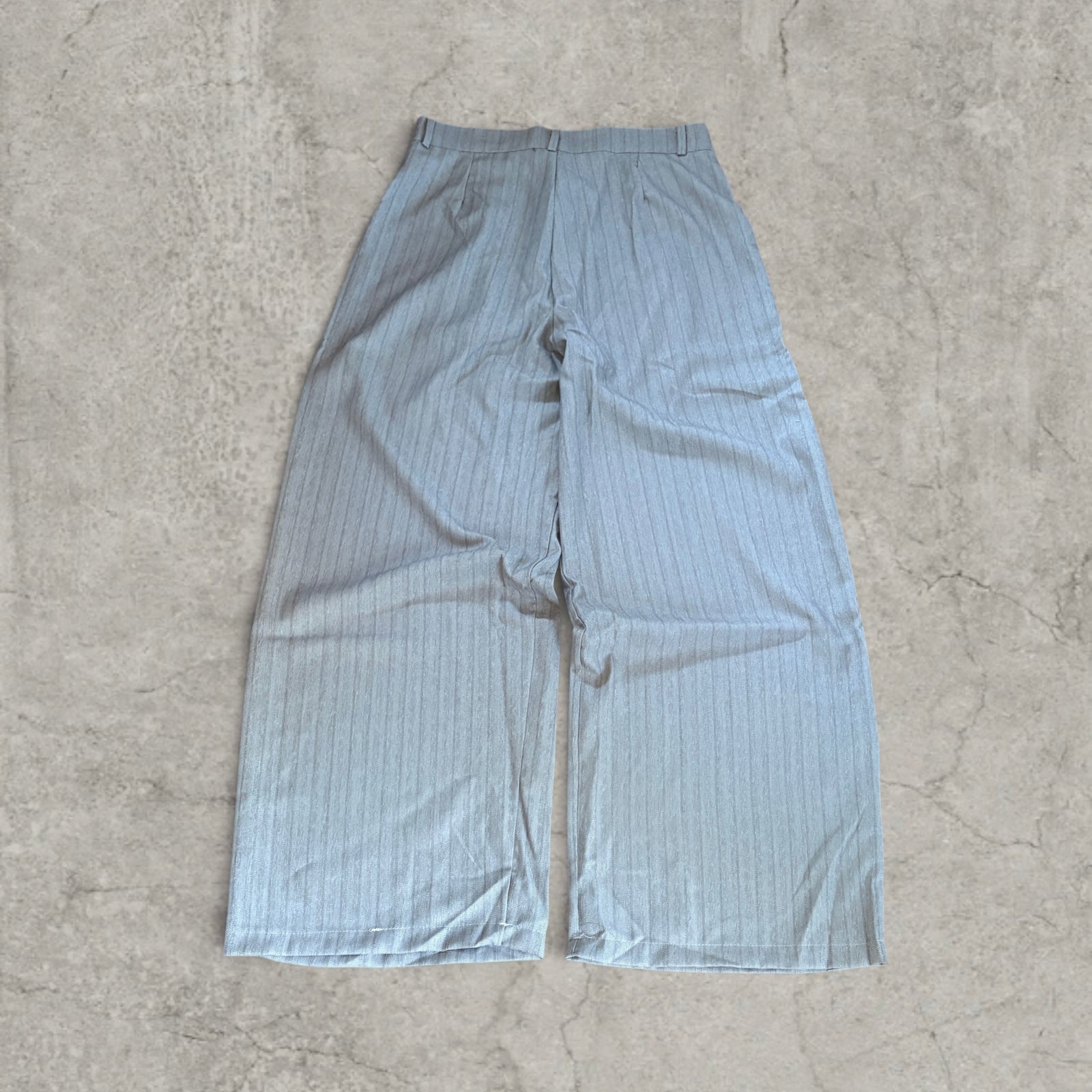 Wide-leg pinstriped trousers in beige cream