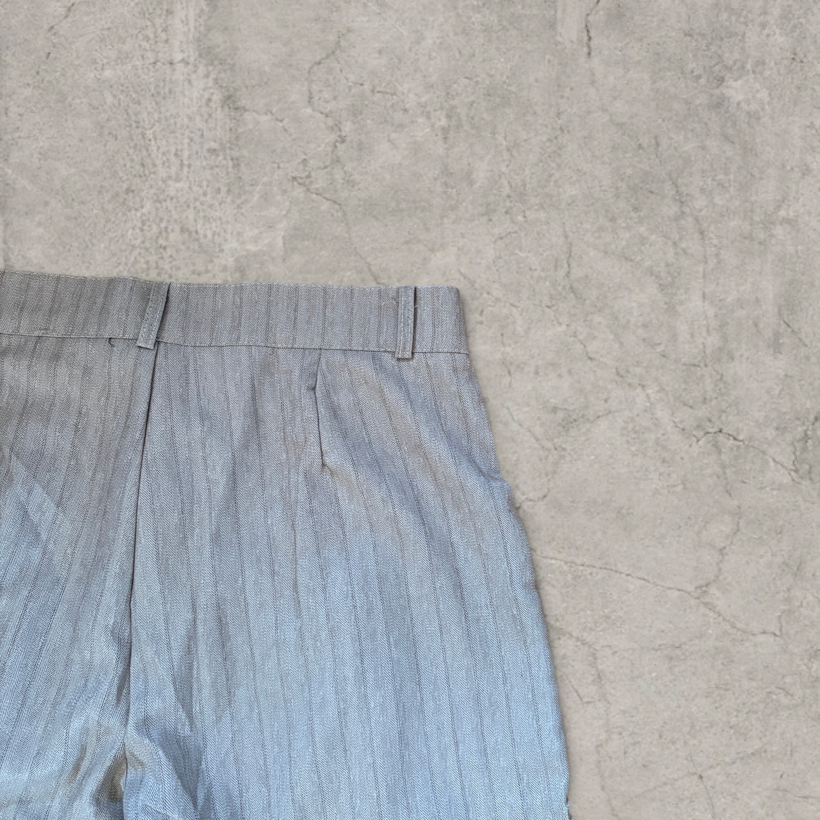 Wide-leg pinstriped trousers in beige cream