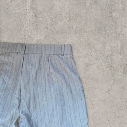 Wide-leg pinstriped trousers in beige cream