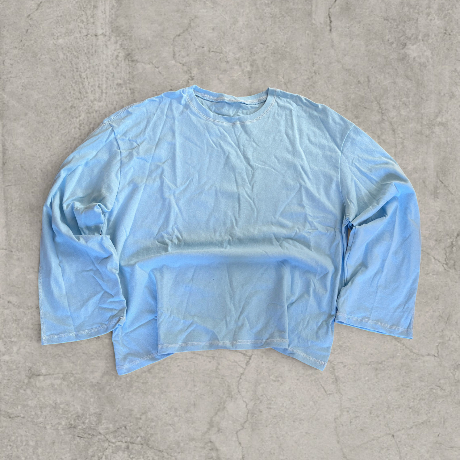 Vintage style relaxed fit long sleeve 100% cotton tshirt top in light blue.