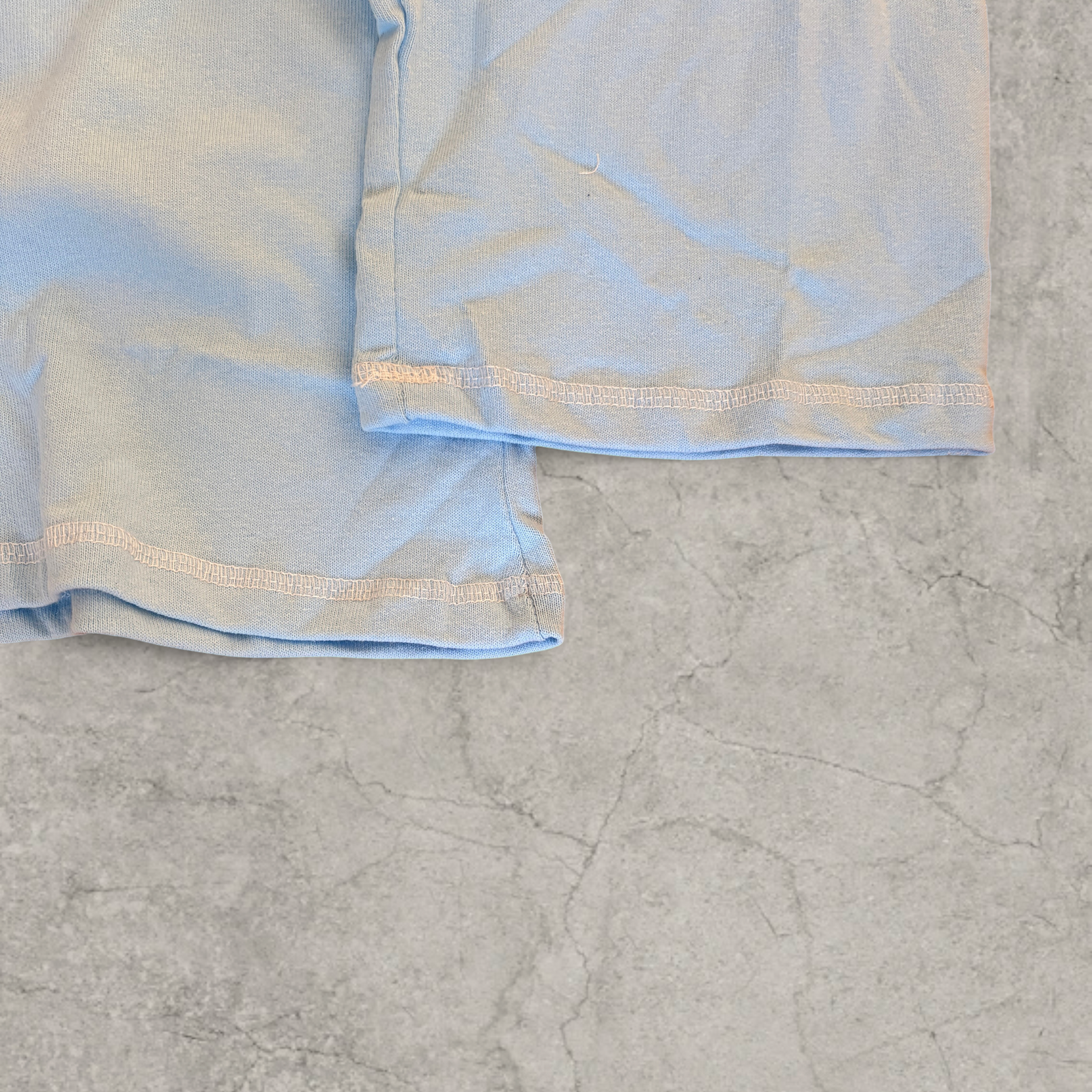 Vintage style relaxed fit long sleeve 100% cotton tshirt top in light blue.