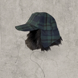 Russian ushanka trapper hat in dark green plaid with black faux fur.