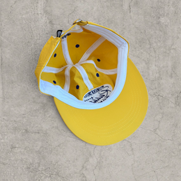 Vintage style baseball cap in yellow with navy blue Scandinavian logo.