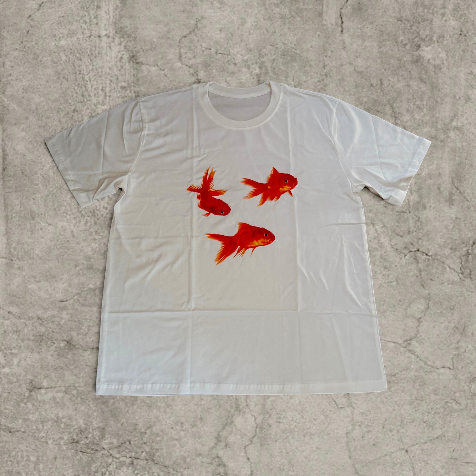 Goldfish vintage style T-shirt with front graphic in white with orange print.