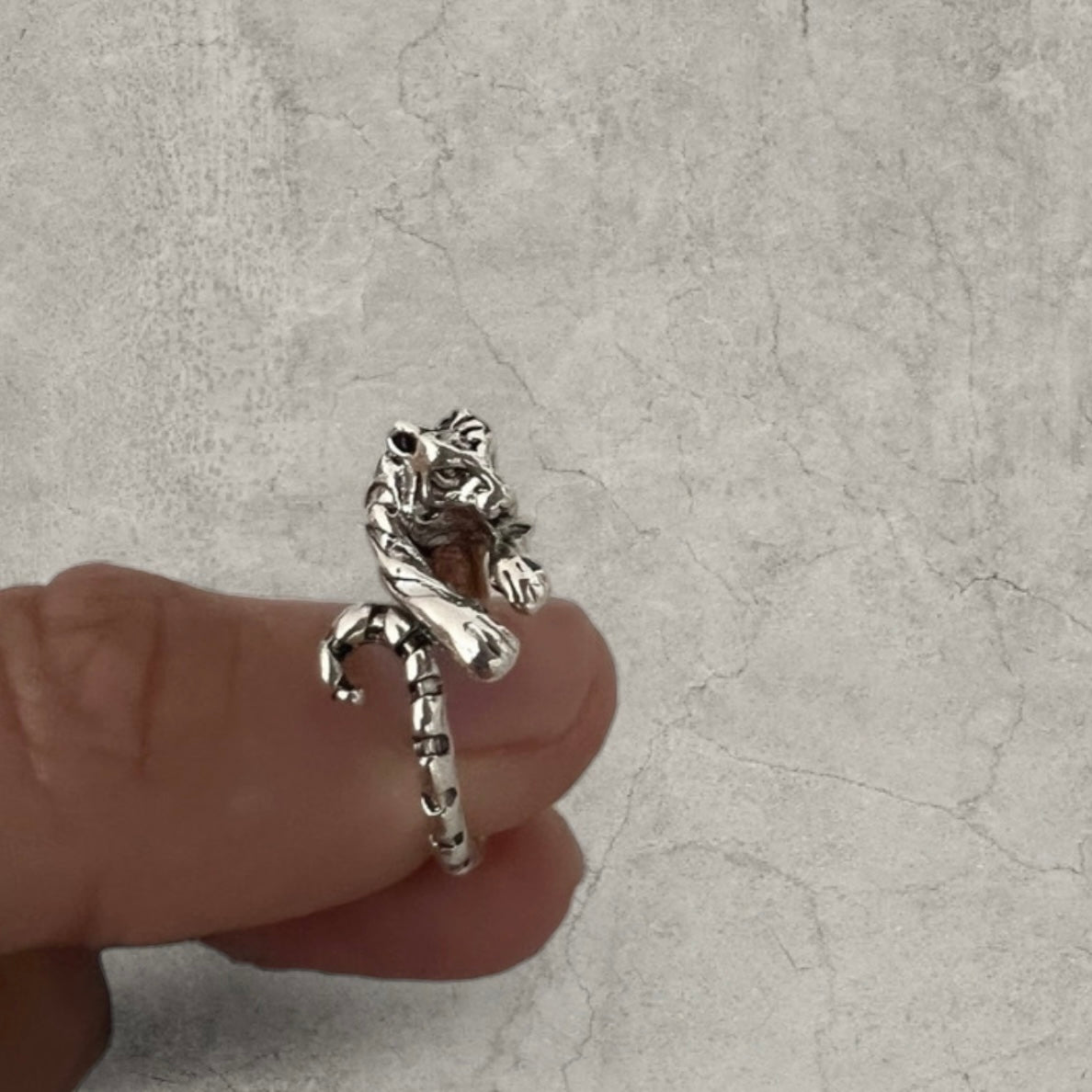 Cool vintage style silver stainless steel ring with tiger animal wrap around. One size, adjustable