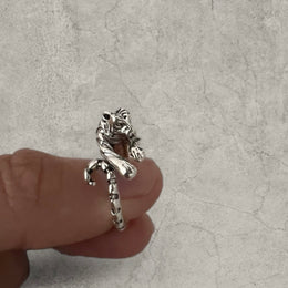 Cool vintage style silver stainless steel ring with tiger animal wrap around. One size, adjustable