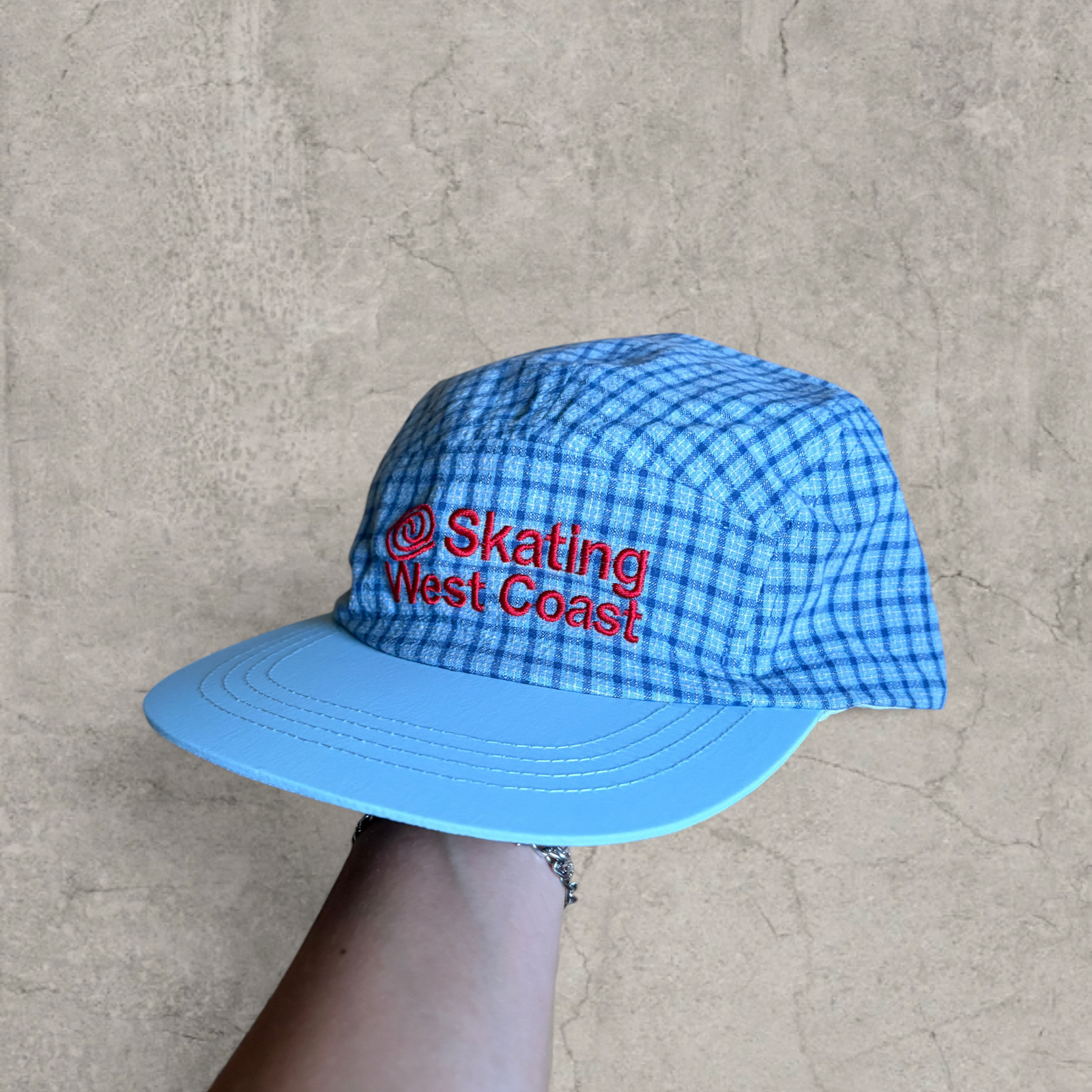 Vintage style baseball cap in blue with Skate club logo.