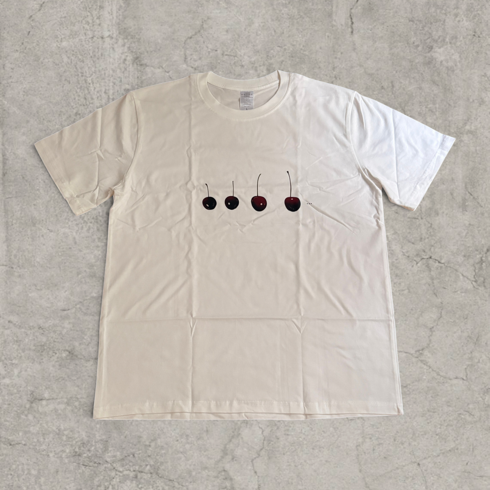 Cherry vintage style T-shirt with front graphic in white with burgundy red print.