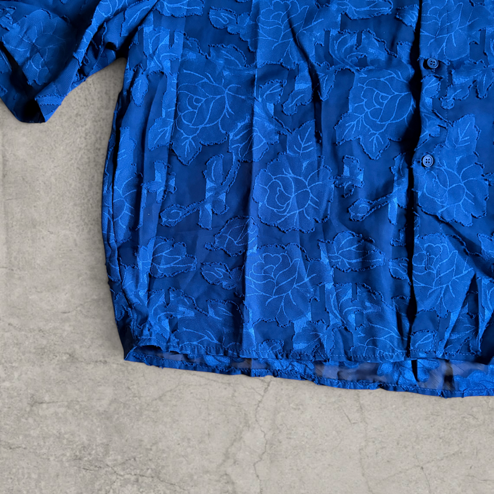 Cool boxy 90s style blue floral short sleeved shirt.