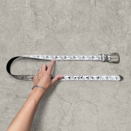 Vintage style faux leather western cowboy belt in white with silver trim. 103cm.