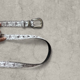 Vintage style faux leather western cowboy belt in white with silver trim. 103cm.